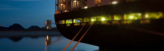 Ship at anchor with lights on 