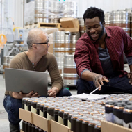 two males in conversation, sustainability training