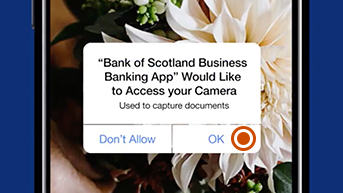 If asked, ‘allow’ access to your camera to take a photo by selecting 'OK'.