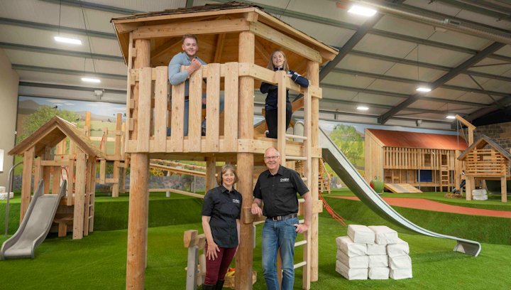 Craigie’s Farm staff standing infron of the new wooden adventure area
