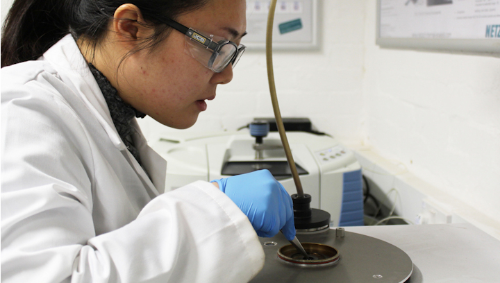 Scientist using lab equipment