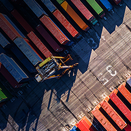Busy trade port with many cargo containers of various colours