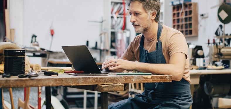 Man working on laptop at work